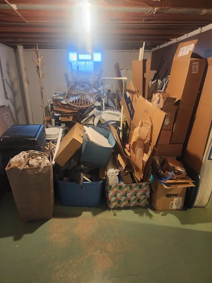 Roll-off dumpster container at job site for 15 Yard Dumpster Rental in Kalispell